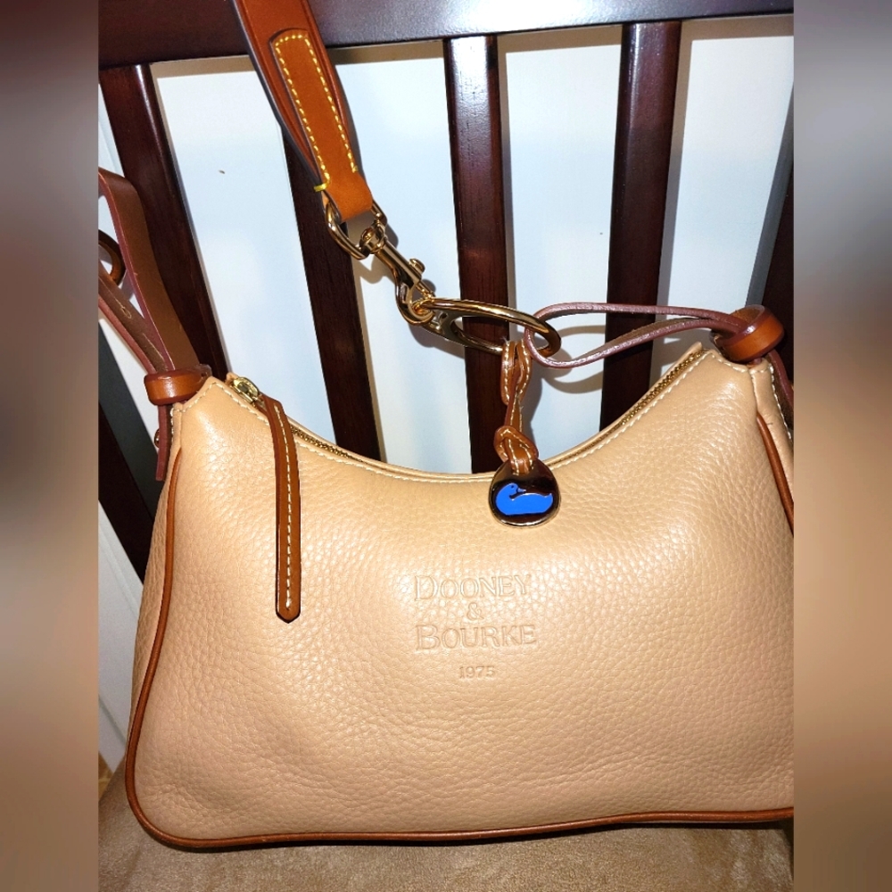 Dooney and Bourke light camel shoulder bag.